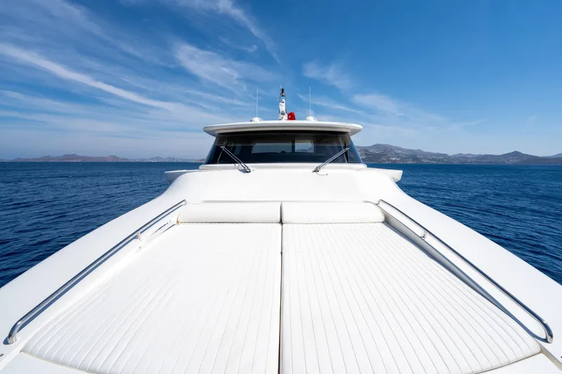 La Luce Yacht Photos Pics Custom Line Navetta 26 yacht, 2008 model, cruising on open sea under clear blue sky.