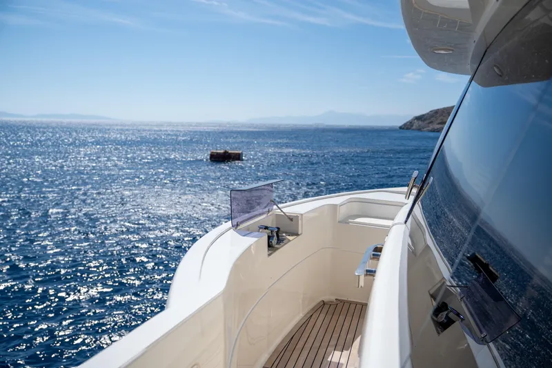 La Luce Yacht Photos Pics Custom Line Navetta 26 yacht deck overlooking serene ocean, 2008 model.