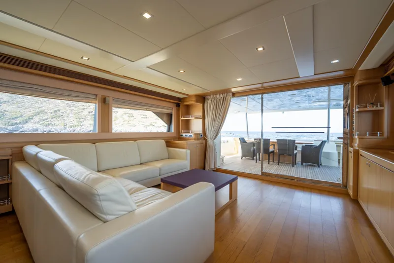La Luce Yacht Photos Pics Luxurious interior of 2008 Custom Line Navetta 26 yacht with elegant seating and ocean view.