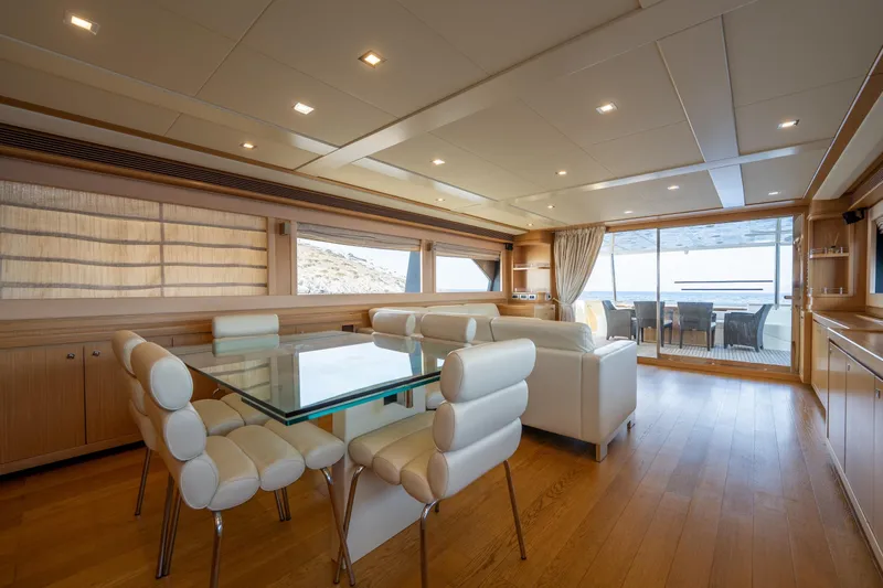 La Luce Yacht Photos Pics Luxurious interior of 2008 Custom Line Navetta 26 yacht with elegant dining and seating area.