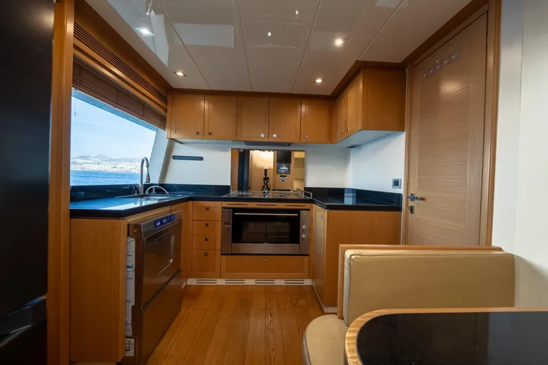 La Luce Yacht Photos Pics Luxurious kitchen interior of 2008 Custom Line Navetta 26 yacht with modern appliances.