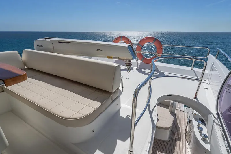 Elena I Yacht Photos Pics 2013 Azimut 64 yacht deck with seating, ocean view, and life rings.