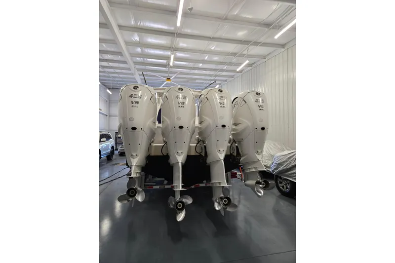  Yacht Photos Pics Four Yamaha 425 V8 outboard engines on a 2020 Regulator 41 boat in a garage.