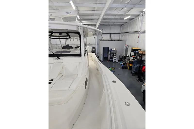  Yacht Photos Pics 2020 Regulator 41 boat in a workshop, showcasing sleek design and spacious interior.