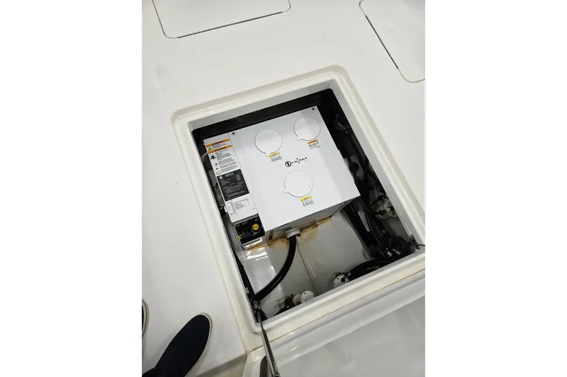  Yacht Photos Pics 2020 Regulator 41 boat compartment with electrical components and wiring.
