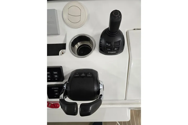  Yacht Photos Pics Control panel of 2020 Regulator 41 boat featuring Yamaha joystick and throttle.
