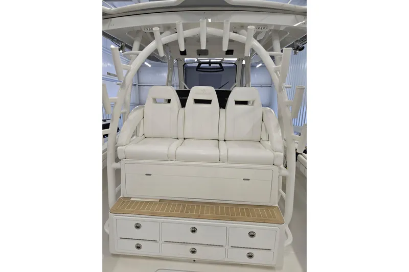  Yacht Photos Pics 2020 Regulator 41 boat interior with white seating and storage compartments.