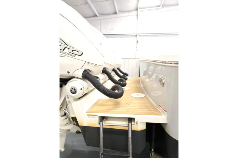  Yacht Photos Pics 2020 Regulator 41 boat with powerful outboard engines and teak swim platform.