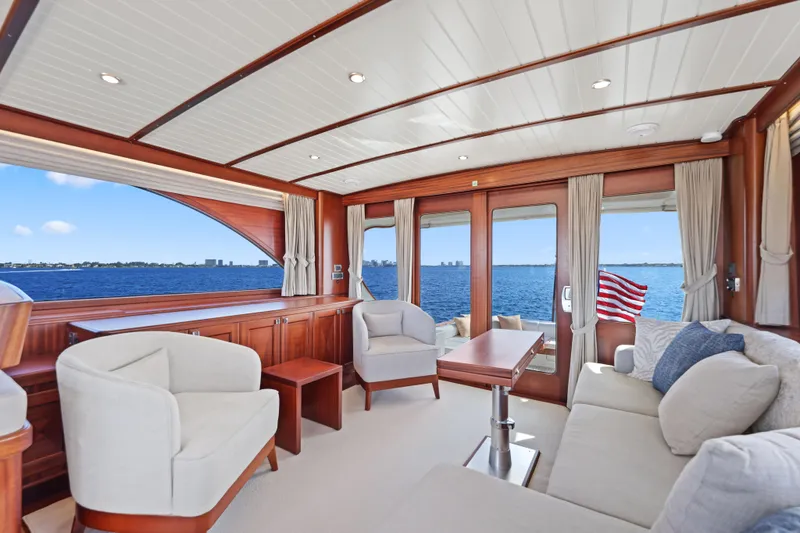 Bebe Deux Yacht Photos Pics Luxurious interior of 2023 Vicem 65 Classic yacht with elegant seating and ocean view.