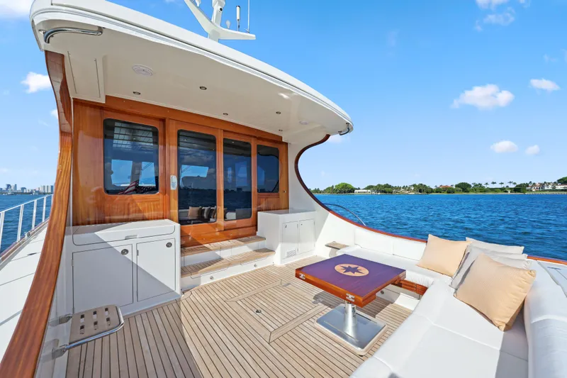 Bebe Deux Yacht Photos Pics 2023 Vicem 65 Classic yacht deck with elegant seating and ocean view.