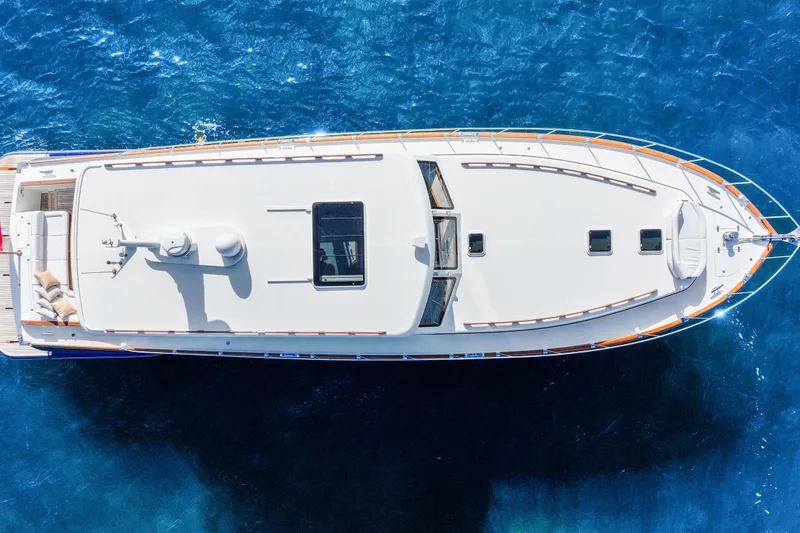 Bebe Deux Yacht Photos Pics Aerial view of 2023 Vicem 65 Classic yacht on clear blue water.