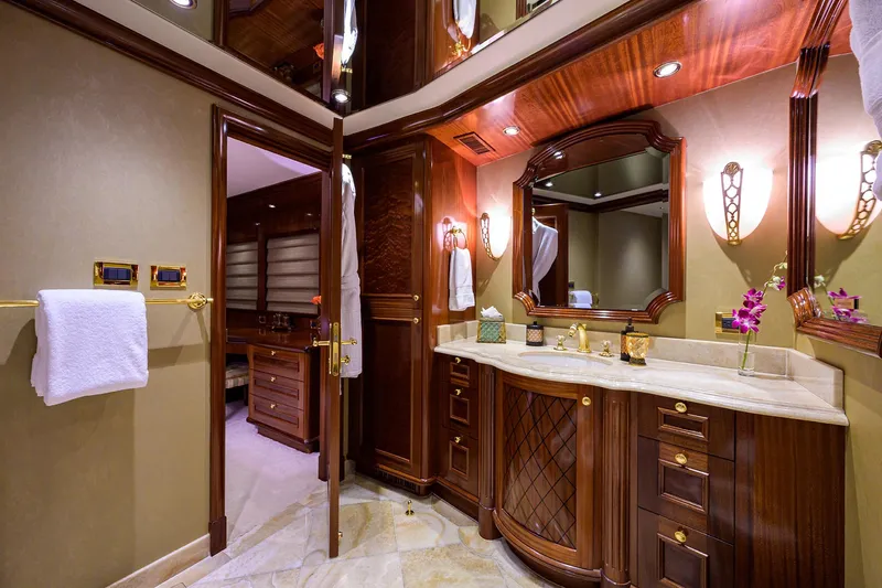 Excellence Yacht Photos Pics Luxurious Richmond Yachts 150 bathroom, 2010 model, featuring elegant wood cabinetry and marble countertops.