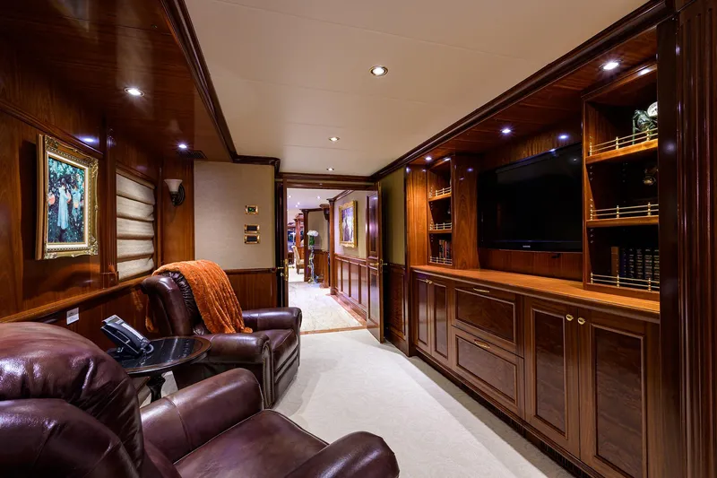 Excellence Yacht Photos Pics Luxurious interior of 2010 Richmond Yachts 150, featuring leather seating and elegant wood paneling.