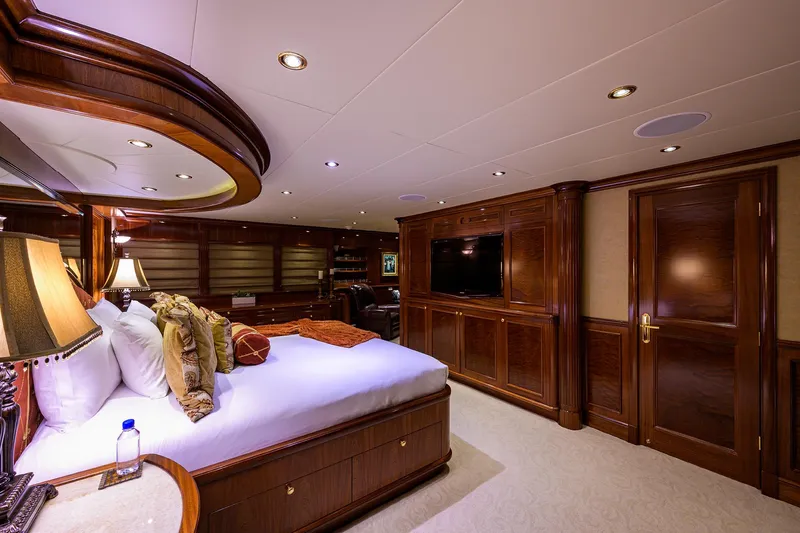 Excellence Yacht Photos Pics Luxurious Richmond Yachts 150 bedroom interior, 2010 model, featuring elegant wood paneling and ambient lighting.