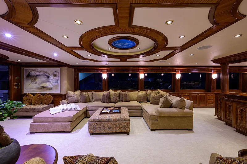 Excellence Yacht Photos Pics Luxurious interior of 2010 Richmond Yachts 150 with elegant seating and ornate ceiling design.