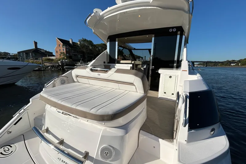  Yacht Photos Pics 2018 Regal 42 Sport Coupe yacht docked, showcasing sleek design and spacious deck.