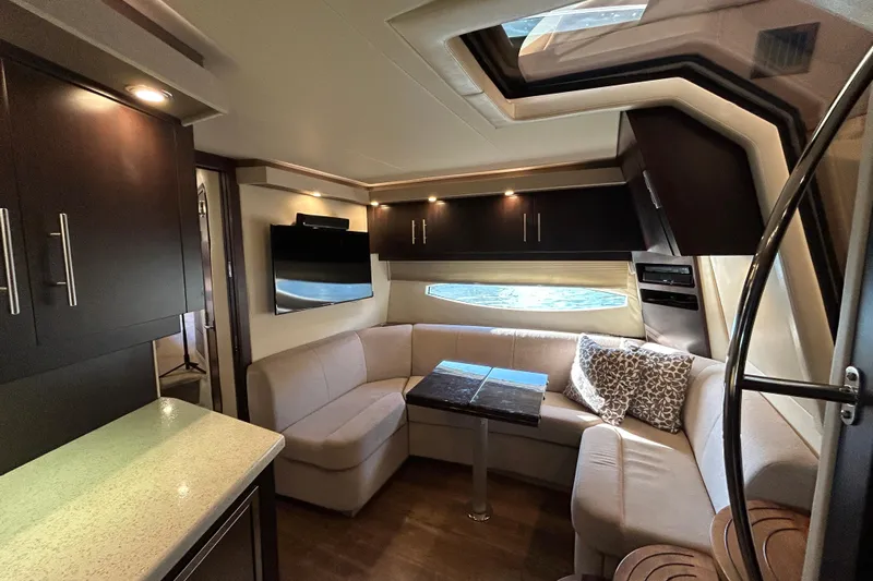  Yacht Photos Pics Luxurious interior of 2018 Regal 42 Sport Coupe yacht with modern furnishings and elegant design.
