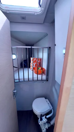  Yacht Photos Pics 2018 Fountaine Pajot Saona 47 yacht bathroom with toilet and storage.