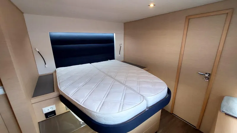  Yacht Photos Pics Interior cabin of 2018 Fountaine Pajot Saona 47 with a comfortable bed.