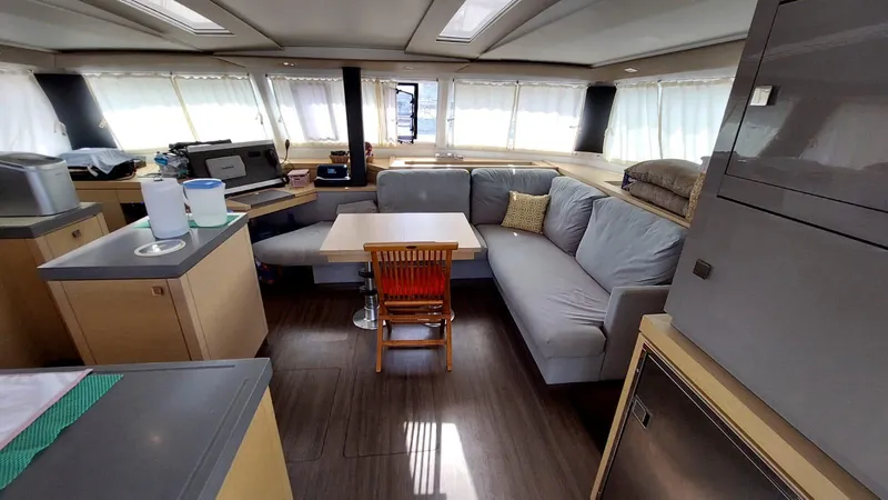  Yacht Photos Pics Interior of 2018 Fountaine Pajot Saona 47 catamaran with modern furnishings and spacious layout.