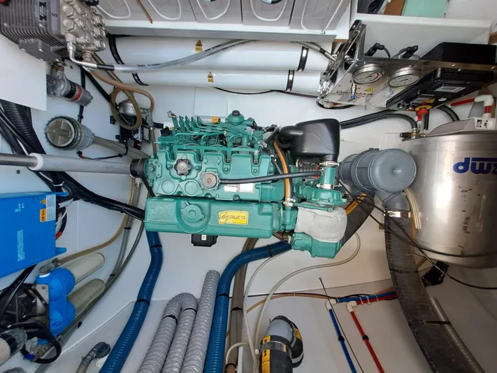  Yacht Photos Pics Engine room of 2018 Fountaine Pajot Saona 47 catamaran with visible machinery and components.