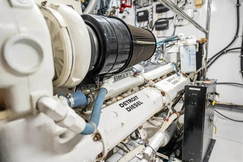 Hatt's Off Yacht Photos Pics Engine room of 1998 Hatteras 74 Cockpit Motor Yacht with Detroit Diesel engine.