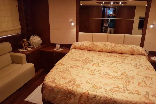  Yacht Photos Pics Luxurious bedroom interior of 2008 Sunseeker Predator 72 yacht with elegant decor.
