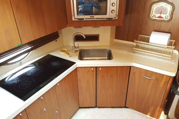  Yacht Photos Pics Luxurious Sunseeker Predator 72 yacht kitchen with modern appliances, 2008 model.