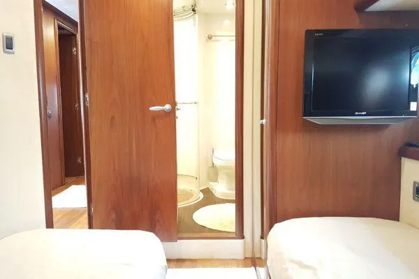  Yacht Photos Pics Interior of 2008 Sunseeker Predator 72 yacht with bathroom and TV.