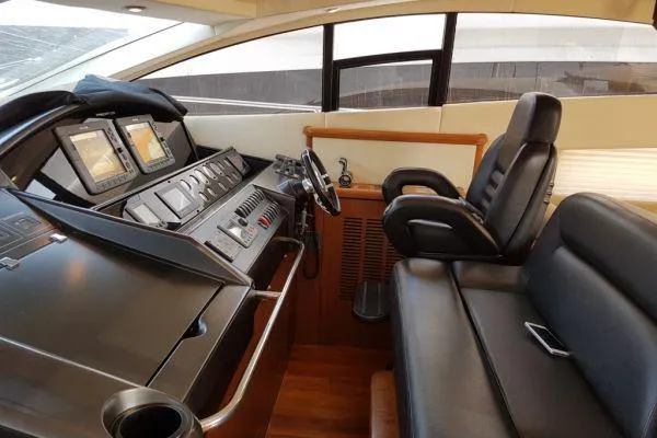  Yacht Photos Pics 2008 Sunseeker Predator 72 yacht helm with leather seating and advanced navigation controls.
