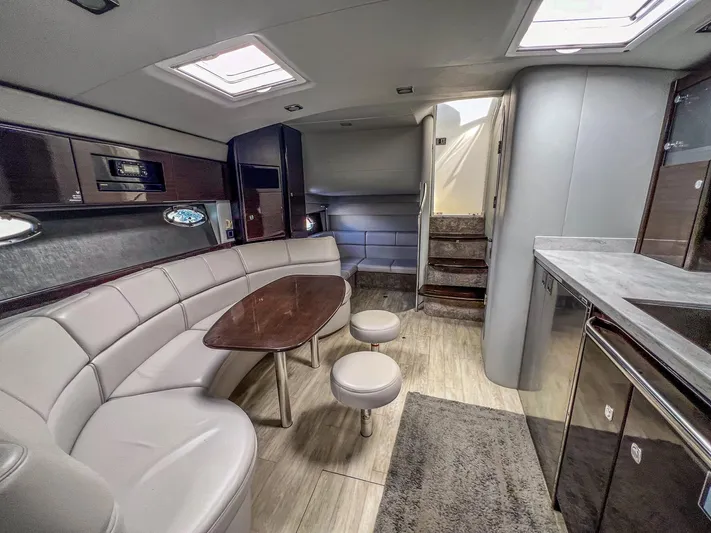 Liquid Asset Yacht Photos Pics Luxurious interior of a 2017 Formula 40 PC yacht with modern furnishings.