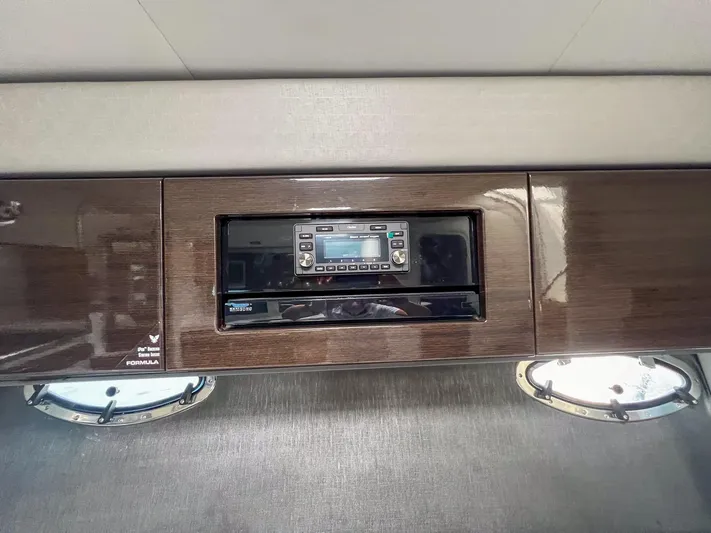 Liquid Asset Yacht Photos Pics Built-in stereo system in 2017 Formula 40 PC yacht interior.