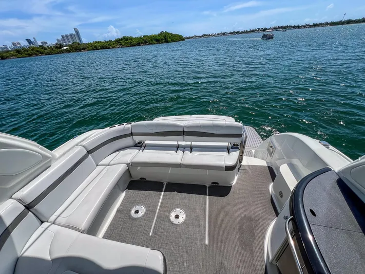 Liquid Asset Yacht Photos Pics 2017 Formula 40 PC boat with spacious seating on a sunny day.