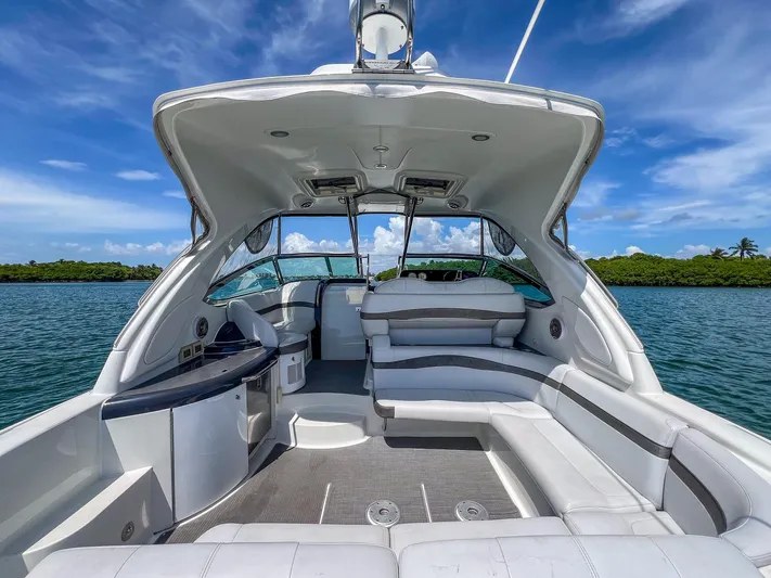 Liquid Asset Yacht Photos Pics 2017 Formula 40 PC yacht interior with spacious seating and scenic water view.