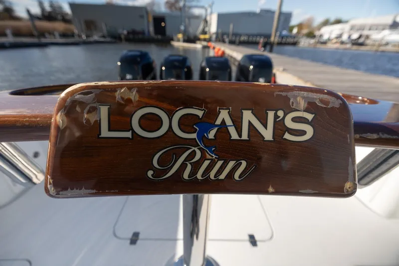  Yacht Photos Pics 2018 Yellowfin 39 Offshore boat with "Logan's Run" nameplate at dock.