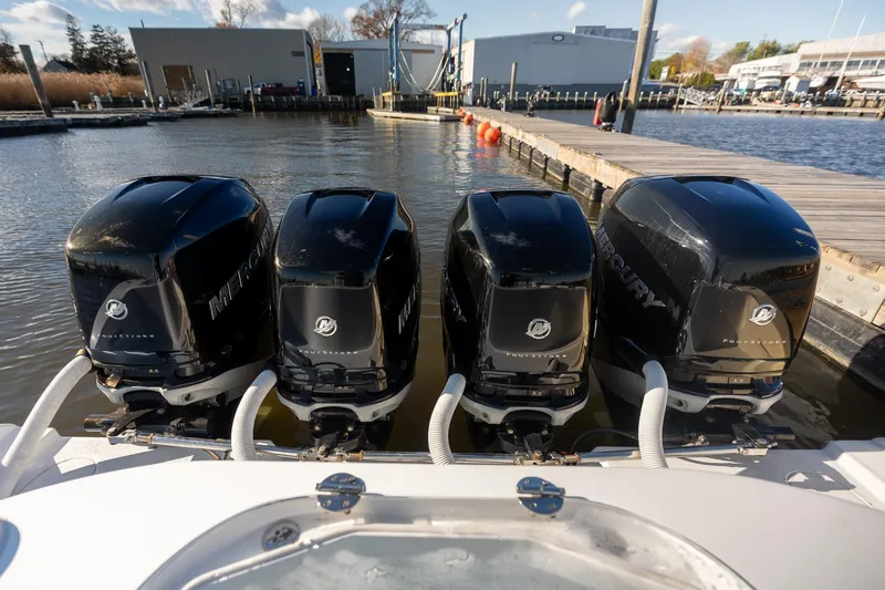  Yacht Photos Pics Four Mercury outboard engines on a 2018 Yellowfin 39 Offshore boat at a dock.