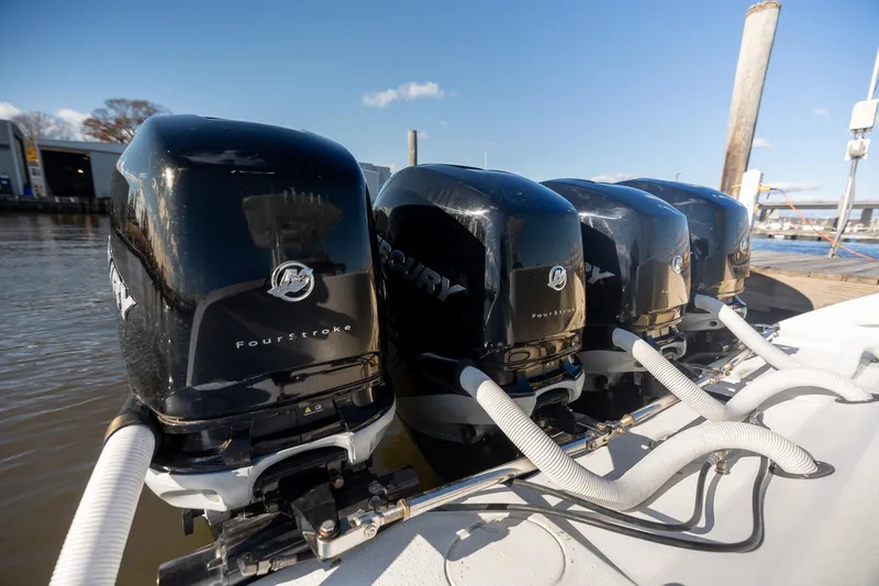  Yacht Photos Pics Four Mercury outboard engines on a 2018 Yellowfin 39 Offshore boat at a dock.