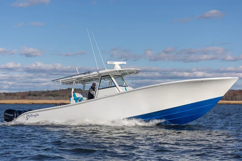  Yacht Photos Pics 2018 Yellowfin 39 Offshore boat cruising on open water under a clear sky.