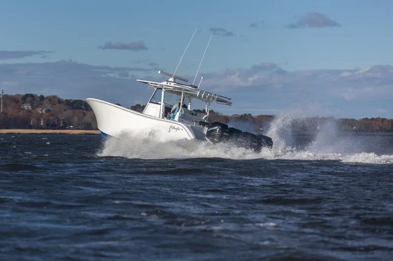  Yacht Photos Pics 2018 Yellowfin 39 Offshore boat cruising on open water with powerful engines.