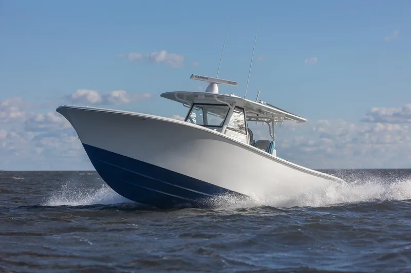  Yacht Photos Pics 2018 Yellowfin 39 Offshore boat cruising on open water under clear skies.