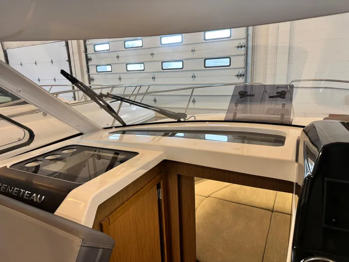  Yacht Photos Pics Interior view of 2022 Beneteau Antares 9 boat, showcasing helm and dashboard.