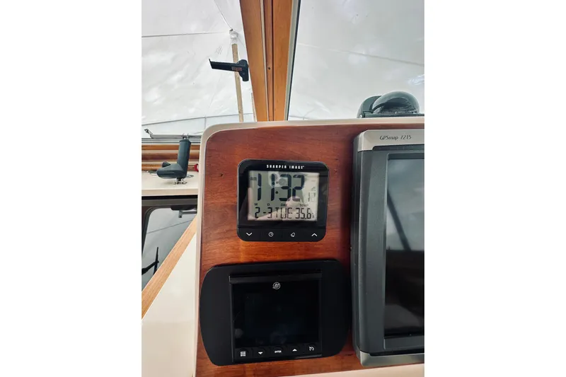 Grand Finale Yacht Photos Pics 2008 Sabre 38 Hard Top Express dashboard with digital display and GPS system.