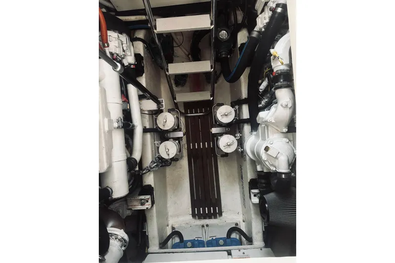 Grand Finale Yacht Photos Pics Engine room of 2008 Sabre 38 Hard Top Express, showcasing mechanical components.