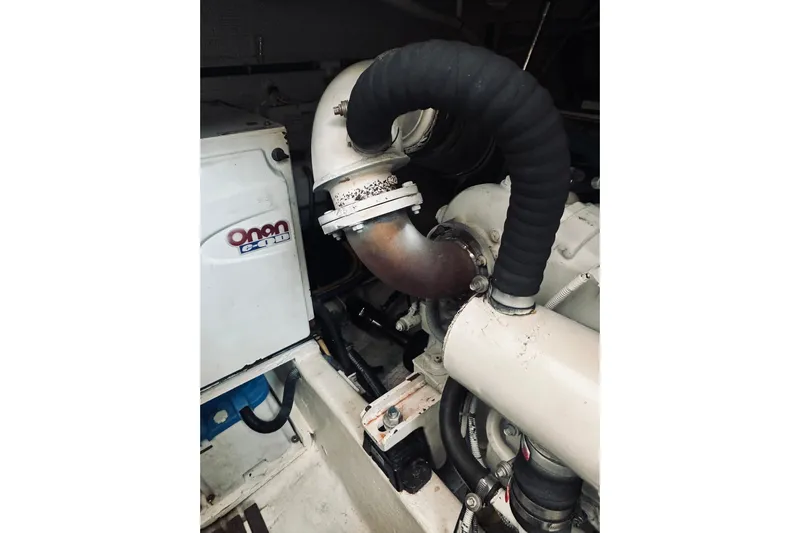 Grand Finale Yacht Photos Pics Engine compartment of 2008 Sabre 38 Hard Top Express with Onan generator.
