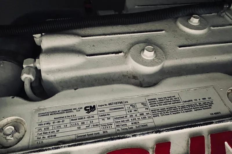 Grand Finale Yacht Photos Pics Engine label of a 2008 Sabre 38 Hard Top Express, featuring Cummins specifications.