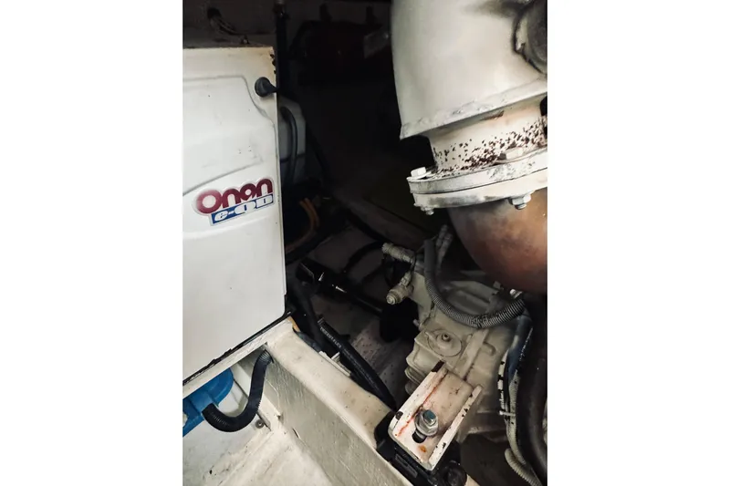 Grand Finale Yacht Photos Pics Engine room of 2008 Sabre 38 Hard Top Express with Onan generator.