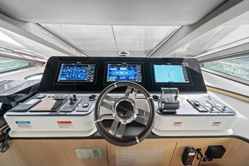 No Name Yacht Photos Pics Cockpit of 2022 Azimut Grande 27 METRI yacht with advanced navigation displays.