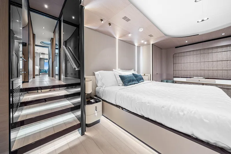 No Name Yacht Photos Pics Luxurious bedroom interior of 2022 Azimut Grande 27 METRI yacht, featuring modern design and elegant decor.