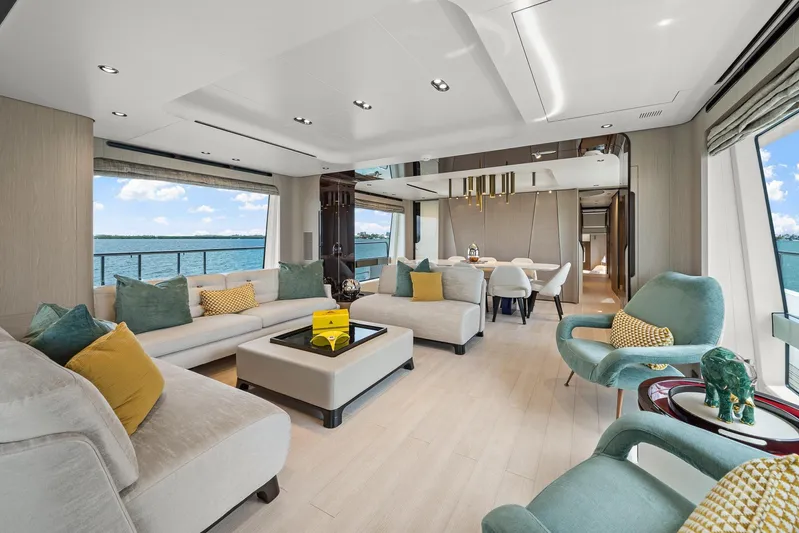 No Name Yacht Photos Pics Luxurious interior of 2022 Azimut Grande 27 METRI yacht with elegant seating and ocean view.