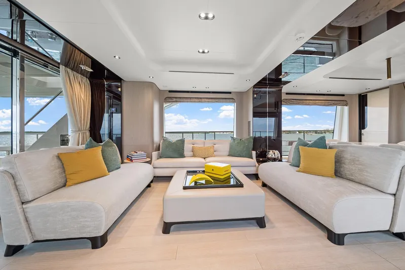 No Name Yacht Photos Pics Luxurious interior of 2022 Azimut Grande 27 METRI yacht with elegant seating and panoramic views.